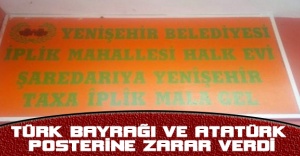 Türk bayrağı ve Atatürk posterine zarar verdi